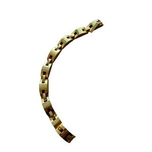 Designer style gold tone bracelet